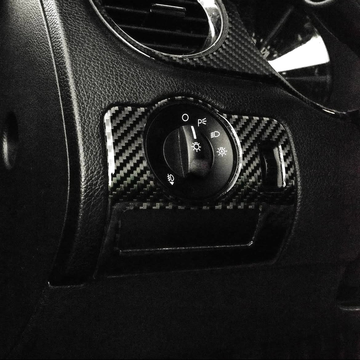 2010-2014 Carbon Fiber Headlight Control Overlay